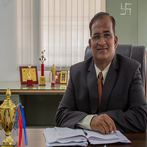 Dr. Anil Matkar,Director